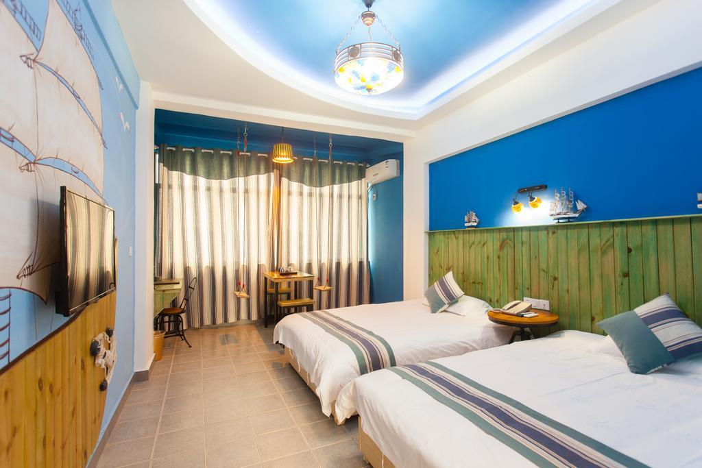 Haikou Time Inn Theme Hotel Стая снимка