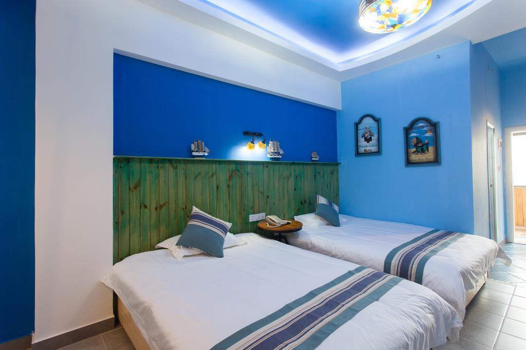 Haikou Time Inn Theme Hotel Стая снимка